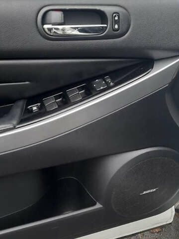 Белый Мазда СХ-7, объемом двигателя 2.26 л и пробегом 165 тыс. км за 8700 $, фото 12 на Automoto.ua