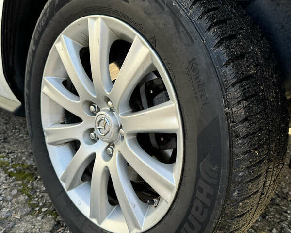 Білий Мазда СХ-7, об'ємом двигуна 2.49 л та пробігом 350 тис. км за 8200 $, фото 49 на Automoto.ua