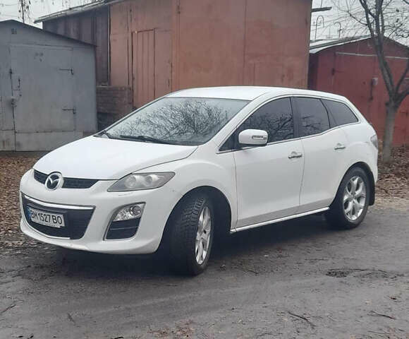 Белый Мазда СХ-7, объемом двигателя 2.26 л и пробегом 165 тыс. км за 8700 $, фото 5 на Automoto.ua