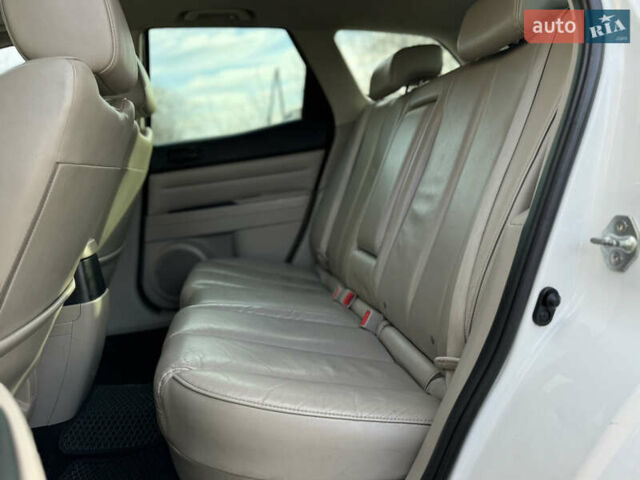 Білий Мазда СХ-7, об'ємом двигуна 2.49 л та пробігом 350 тис. км за 8200 $, фото 20 на Automoto.ua