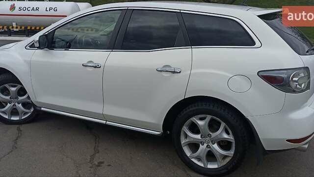 Белый Мазда СХ-7, объемом двигателя 2.26 л и пробегом 193 тыс. км за 8500 $, фото 13 на Automoto.ua