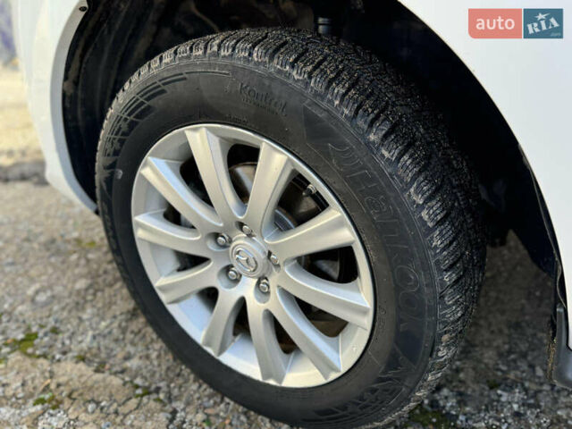 Білий Мазда СХ-7, об'ємом двигуна 2.49 л та пробігом 350 тис. км за 8200 $, фото 50 на Automoto.ua