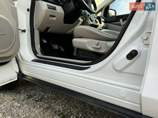 Білий Мазда СХ-7, об'ємом двигуна 2.49 л та пробігом 350 тис. км за 8200 $, фото 25 на Automoto.ua