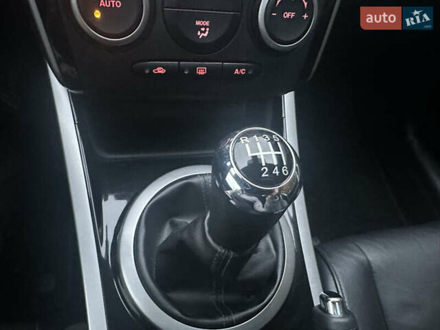 Білий Мазда СХ-7, об'ємом двигуна 2.2 л та пробігом 243 тис. км за 10999 $, фото 44 на Automoto.ua