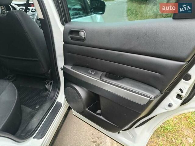 Белый Мазда СХ-7, объемом двигателя 2.18 л и пробегом 168 тыс. км за 10600 $, фото 34 на Automoto.ua