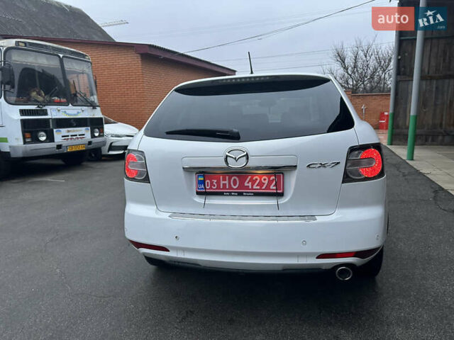Білий Мазда СХ-7, об'ємом двигуна 2.2 л та пробігом 243 тис. км за 10999 $, фото 12 на Automoto.ua