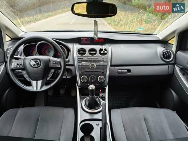 Белый Мазда СХ-7, объемом двигателя 2.18 л и пробегом 168 тыс. км за 10600 $, фото 28 на Automoto.ua
