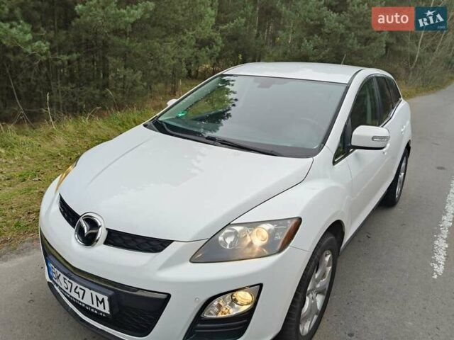 Белый Мазда СХ-7, объемом двигателя 2.18 л и пробегом 168 тыс. км за 10600 $, фото 30 на Automoto.ua