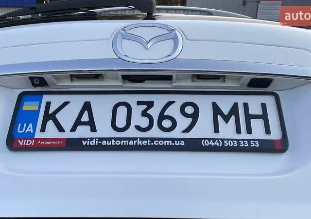 Белый Мазда СХ-7, объемом двигателя 2.26 л и пробегом 73 тыс. км за 13900 $, фото 19 на Automoto.ua