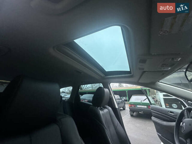 Білий Мазда СХ-7, об'ємом двигуна 2.2 л та пробігом 243 тис. км за 10999 $, фото 38 на Automoto.ua