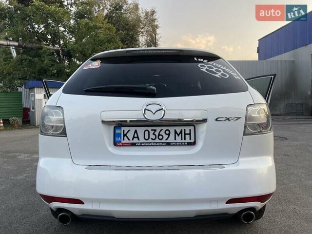 Белый Мазда СХ-7, объемом двигателя 2.26 л и пробегом 73 тыс. км за 13900 $, фото 18 на Automoto.ua