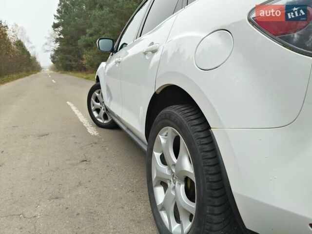 Белый Мазда СХ-7, объемом двигателя 2.18 л и пробегом 168 тыс. км за 10600 $, фото 11 на Automoto.ua