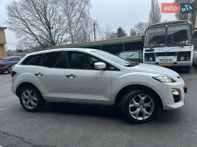 Білий Мазда СХ-7, об'ємом двигуна 2.2 л та пробігом 243 тис. км за 10999 $, фото 6 на Automoto.ua