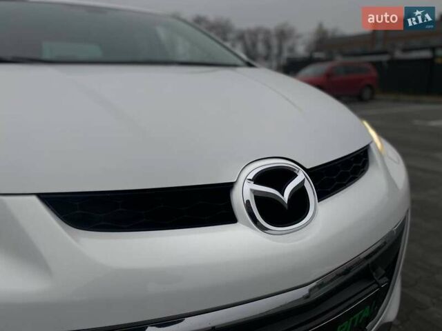 Білий Мазда СХ-7, об'ємом двигуна 2.3 л та пробігом 218 тис. км за 7990 $, фото 6 на Automoto.ua