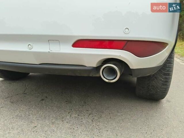 Белый Мазда СХ-7, объемом двигателя 2.18 л и пробегом 168 тыс. км за 10600 $, фото 1 на Automoto.ua