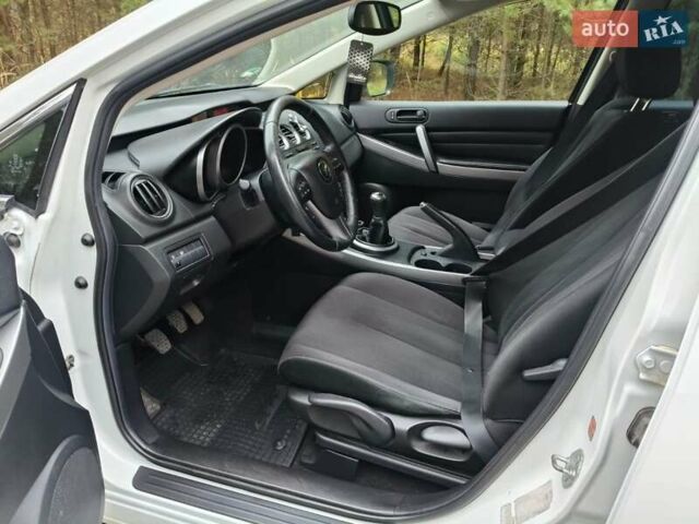 Белый Мазда СХ-7, объемом двигателя 2.18 л и пробегом 168 тыс. км за 10600 $, фото 25 на Automoto.ua