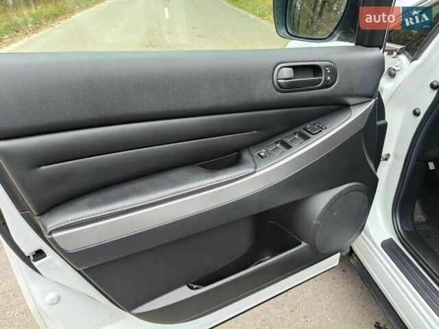 Белый Мазда СХ-7, объемом двигателя 2.18 л и пробегом 168 тыс. км за 10600 $, фото 19 на Automoto.ua