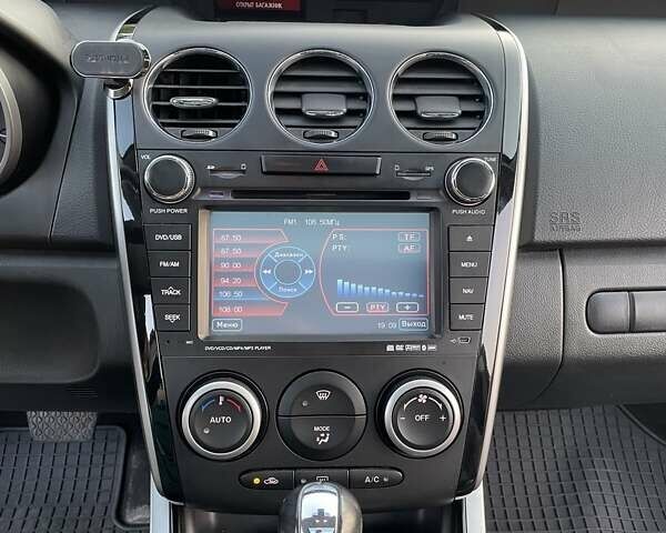 Белый Мазда СХ-7, объемом двигателя 2.26 л и пробегом 73 тыс. км за 13900 $, фото 6 на Automoto.ua
