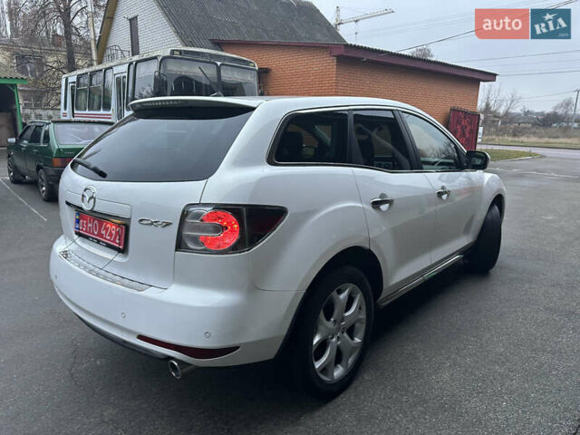 Білий Мазда СХ-7, об'ємом двигуна 2.2 л та пробігом 243 тис. км за 10999 $, фото 9 на Automoto.ua