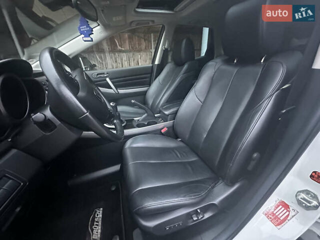 Білий Мазда СХ-7, об'ємом двигуна 2.2 л та пробігом 243 тис. км за 10999 $, фото 30 на Automoto.ua