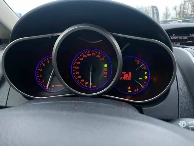 Білий Мазда СХ-7, об'ємом двигуна 2.3 л та пробігом 218 тис. км за 7990 $, фото 18 на Automoto.ua