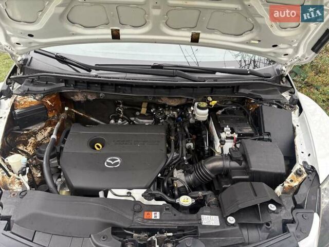 Белый Мазда СХ-7, объемом двигателя 2.49 л и пробегом 151 тыс. км за 10900 $, фото 11 на Automoto.ua