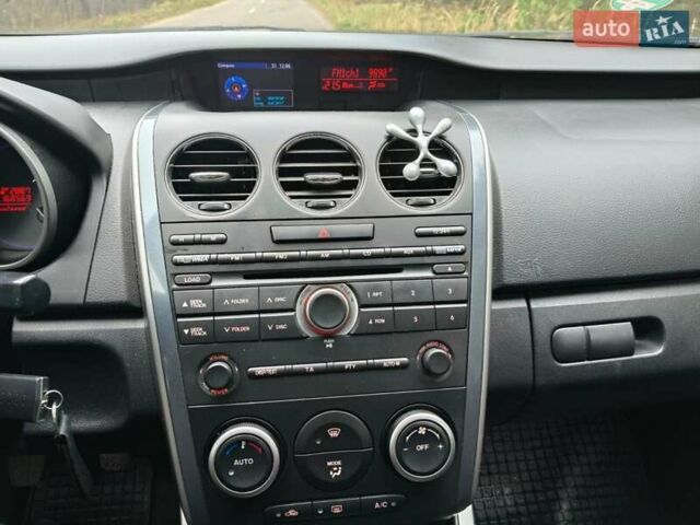 Белый Мазда СХ-7, объемом двигателя 2.18 л и пробегом 168 тыс. км за 10600 $, фото 20 на Automoto.ua