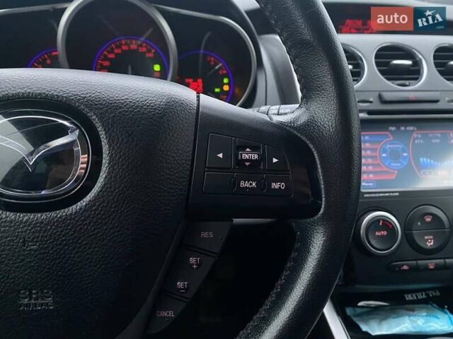 Білий Мазда СХ-7, об'ємом двигуна 2.3 л та пробігом 218 тис. км за 7990 $, фото 33 на Automoto.ua