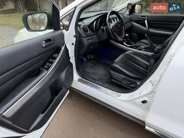 Белый Мазда СХ-7, объемом двигателя 2.18 л и пробегом 229 тыс. км за 10500 $, фото 18 на Automoto.ua