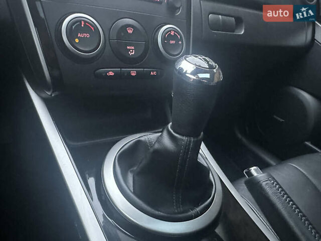 Білий Мазда СХ-7, об'ємом двигуна 2.2 л та пробігом 243 тис. км за 10999 $, фото 45 на Automoto.ua