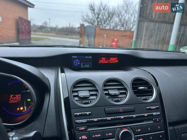 Білий Мазда СХ-7, об'ємом двигуна 2.2 л та пробігом 243 тис. км за 10999 $, фото 42 на Automoto.ua