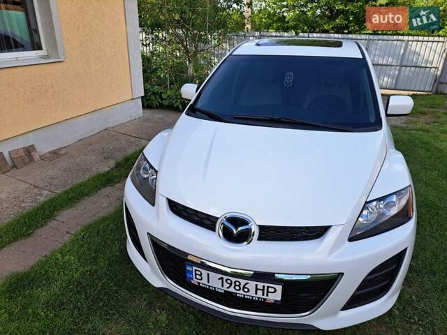 Белый Мазда СХ-7, объемом двигателя 2.49 л и пробегом 220 тыс. км за 11000 $, фото 2 на Automoto.ua