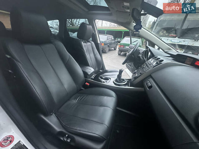 Білий Мазда СХ-7, об'ємом двигуна 2.2 л та пробігом 243 тис. км за 10999 $, фото 35 на Automoto.ua