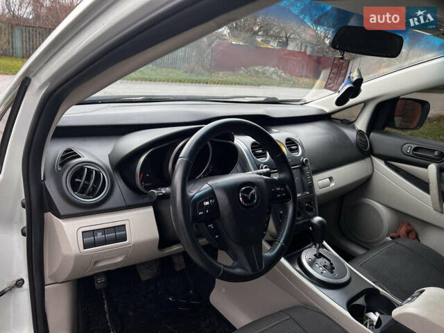 Білий Мазда СХ-7, об'ємом двигуна 2.49 л та пробігом 247 тис. км за 9300 $, фото 17 на Automoto.ua