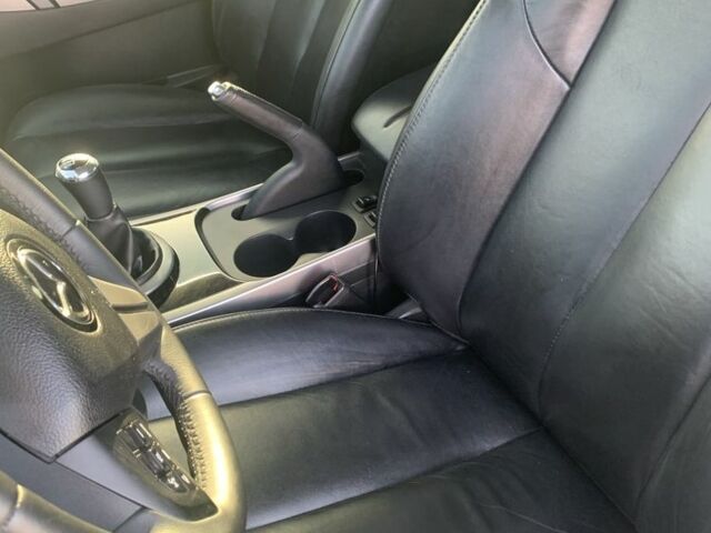 Белый Мазда СХ-7, объемом двигателя 2.2 л и пробегом 185 тыс. км за 9500 $, фото 5 на Automoto.ua