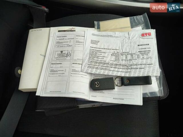 Белый Мазда СХ-7, объемом двигателя 2.18 л и пробегом 168 тыс. км за 10600 $, фото 31 на Automoto.ua