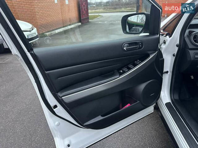 Білий Мазда СХ-7, об'ємом двигуна 2.2 л та пробігом 243 тис. км за 10999 $, фото 27 на Automoto.ua