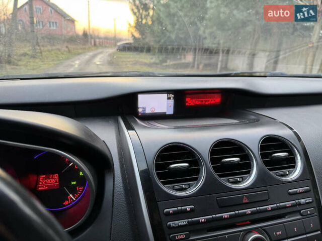 Белый Мазда СХ-7, объемом двигателя 2.18 л и пробегом 229 тыс. км за 10500 $, фото 27 на Automoto.ua