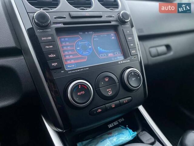 Білий Мазда СХ-7, об'ємом двигуна 2.3 л та пробігом 218 тис. км за 7990 $, фото 40 на Automoto.ua