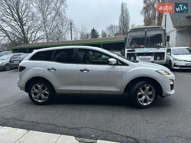 Білий Мазда СХ-7, об'ємом двигуна 2.2 л та пробігом 243 тис. км за 10999 $, фото 7 на Automoto.ua