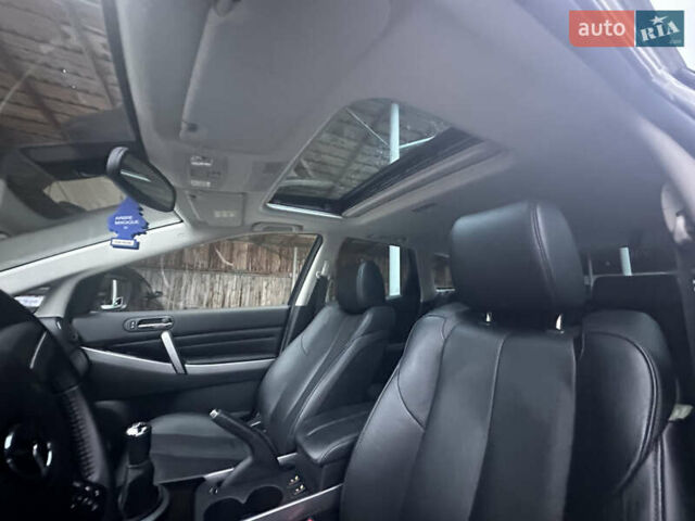 Білий Мазда СХ-7, об'ємом двигуна 2.2 л та пробігом 243 тис. км за 10999 $, фото 31 на Automoto.ua