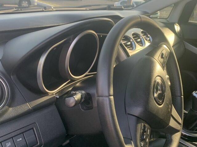 Белый Мазда СХ-7, объемом двигателя 2.2 л и пробегом 185 тыс. км за 9500 $, фото 4 на Automoto.ua