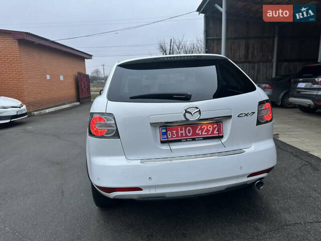 Білий Мазда СХ-7, об'ємом двигуна 2.2 л та пробігом 243 тис. км за 10999 $, фото 13 на Automoto.ua
