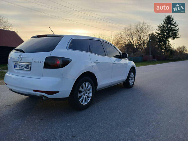 Білий Мазда СХ-7, об'ємом двигуна 2.49 л та пробігом 247 тис. км за 9300 $, фото 9 на Automoto.ua