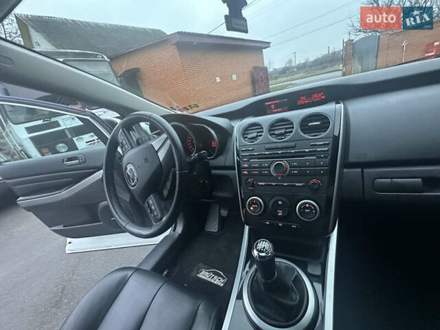 Білий Мазда СХ-7, об'ємом двигуна 2.2 л та пробігом 243 тис. км за 10999 $, фото 36 на Automoto.ua