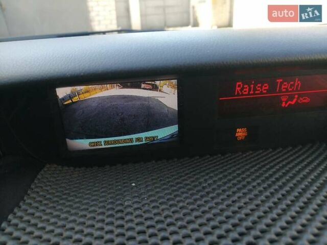 Белый Мазда СХ-7, объемом двигателя 2.26 л и пробегом 241 тыс. км за 9800 $, фото 22 на Automoto.ua