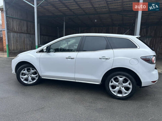 Білий Мазда СХ-7, об'ємом двигуна 2.2 л та пробігом 243 тис. км за 10999 $, фото 19 на Automoto.ua