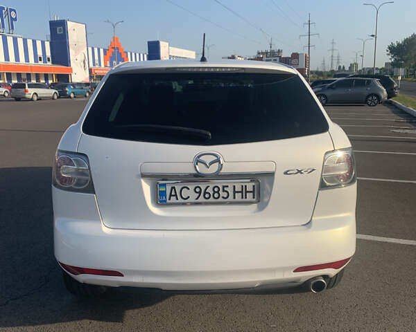 Белый Мазда СХ-7, объемом двигателя 2.2 л и пробегом 185 тыс. км за 9700 $, фото 6 на Automoto.ua