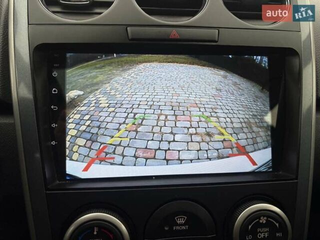 Белый Мазда СХ-7, объемом двигателя 2.49 л и пробегом 151 тыс. км за 10900 $, фото 19 на Automoto.ua