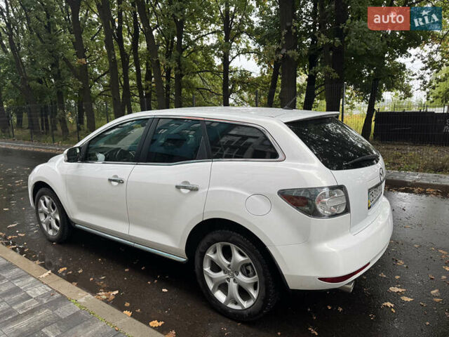 Белый Мазда СХ-7, объемом двигателя 2.26 л и пробегом 135 тыс. км за 12100 $, фото 6 на Automoto.ua